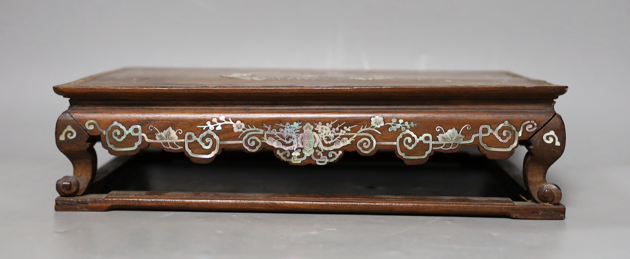 A pair of Chinese hongmu and mother of pearl inlaid stands, 19th century, 31cm wide